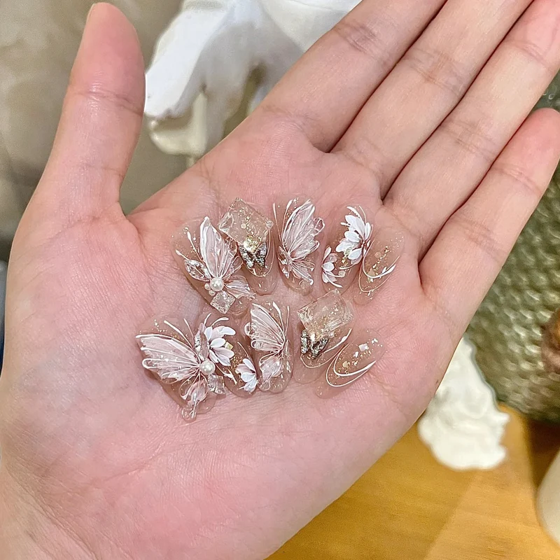 Elegante Lange Press-On Nägel Set mit Künstlerischen Spitzen Karnz