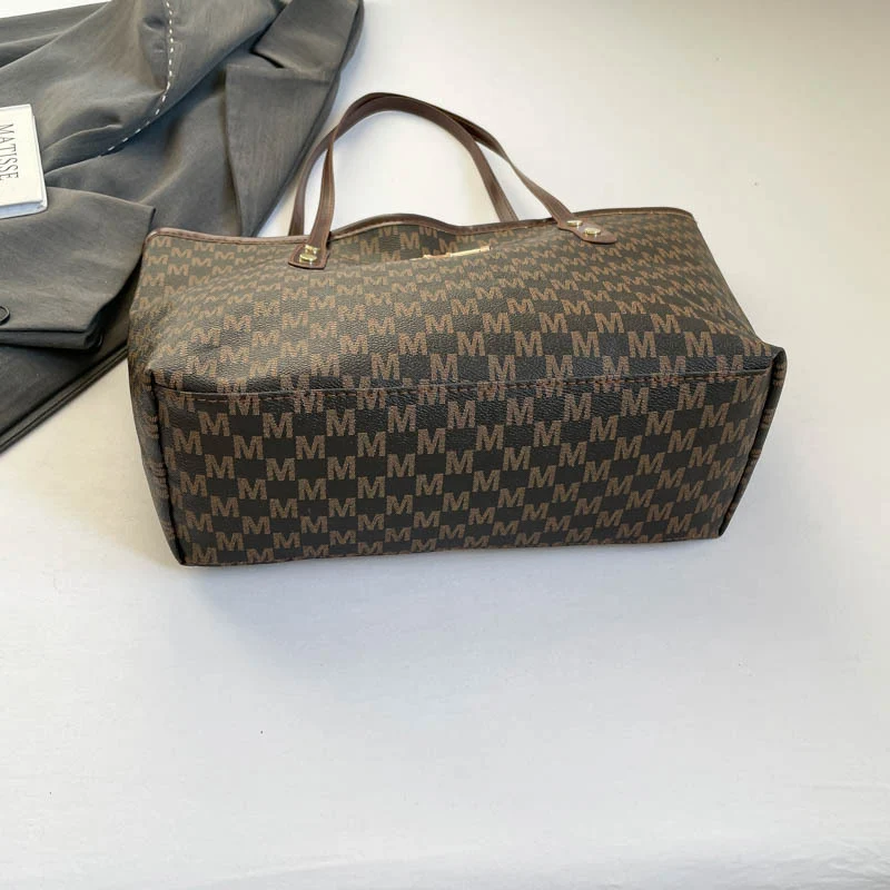 Stylische Flockmuster-Tasche mit dekorativem Bogen
