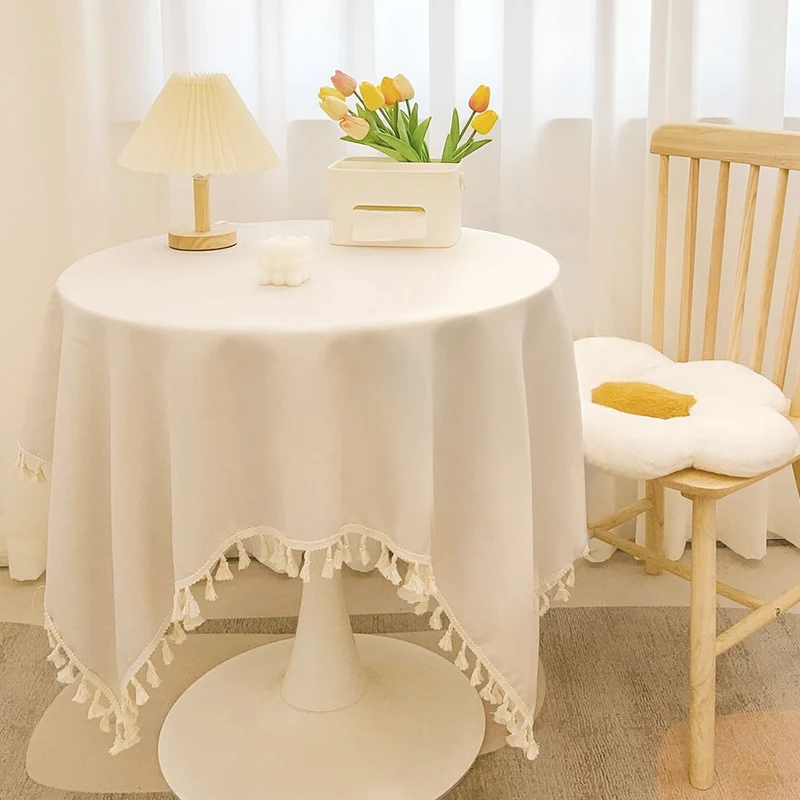 Runde strukturierte Tischdecke mit Quastenbesatz und Leinen-ähnlichem Drapierfinish