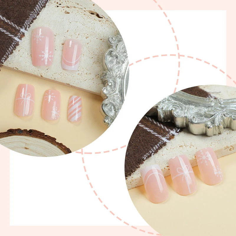 Kunstnagelset mit eleganten floralen und gestreiften Designs Karnz