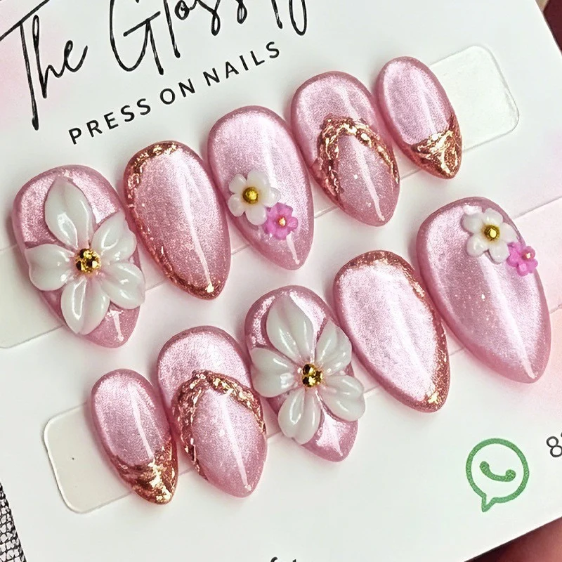 Kunstnagelset mit eleganten Blüten- und Glitzerzeichnungen Karnz