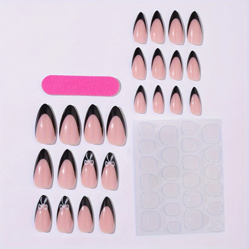 Kunstnagelset mit elegantem Schwarz-Weiß Design und niedlichen Schleifenakzenten Karnz