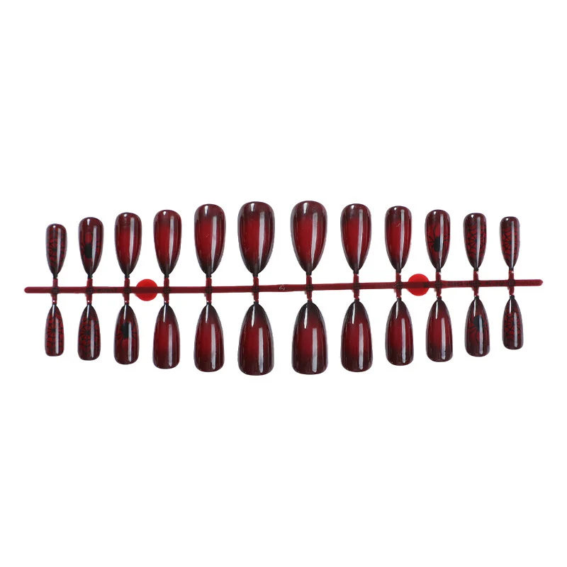 Kunstnagelset mit elegantem länglichen Design Karnz