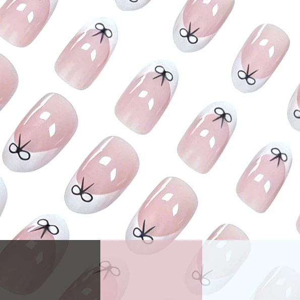 Künstlerische Schleifen-verzierte Nagelkunst Karnz