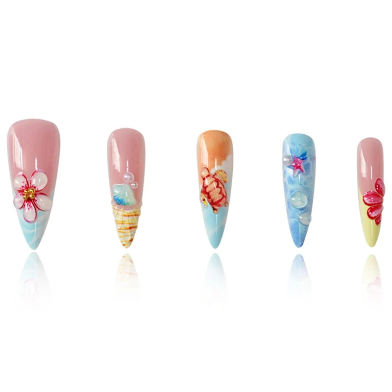 Künstlerisch vom Ozean inspiriertes Nagelkunst-Enhancements Karnz