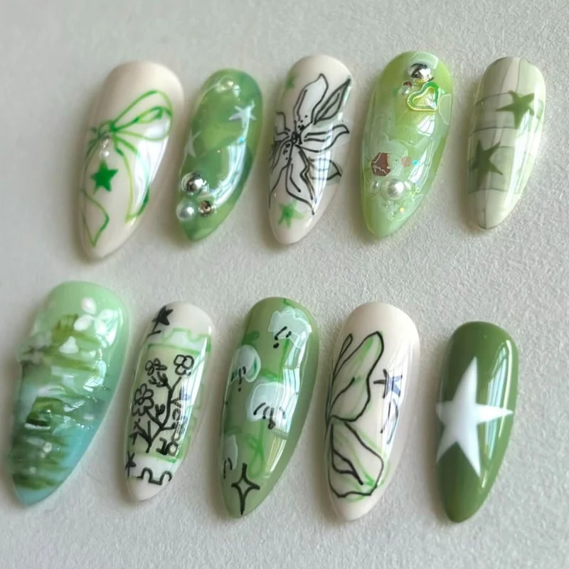 Künstlerische grüne Nagelverbesserungen Karnz