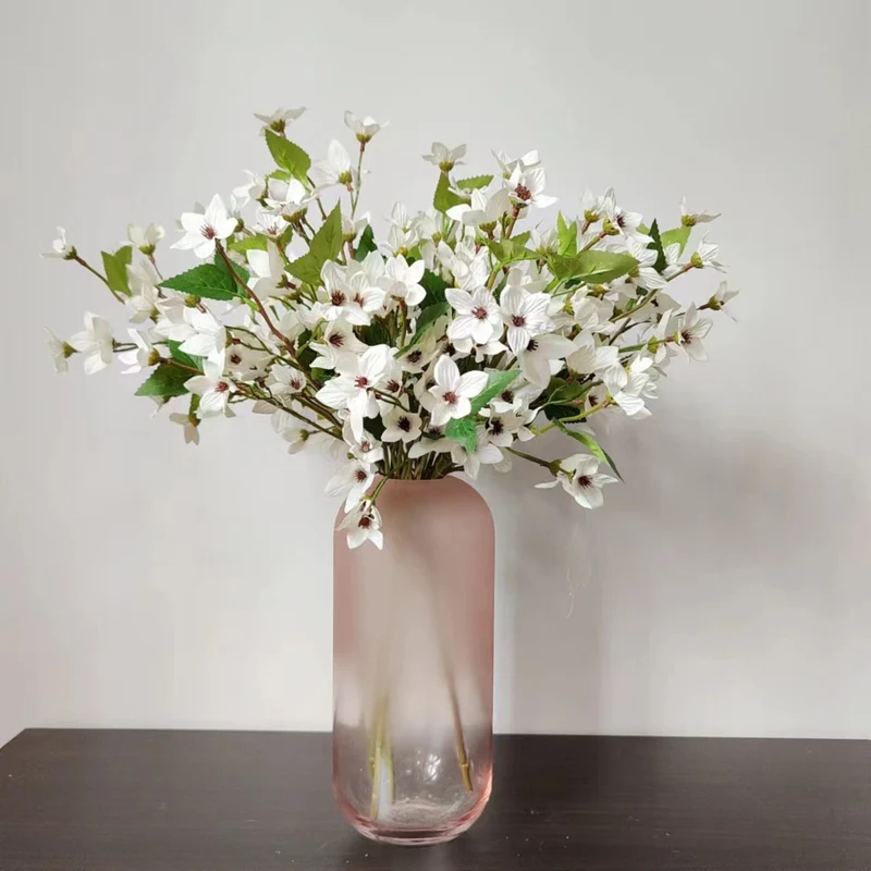Elegante Kunst-Kirschblütenstängel