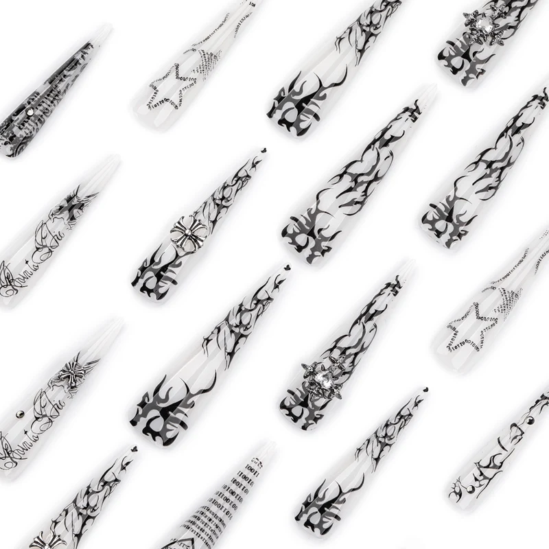 Kunstvolle Stiletto-Nägel mit Gothic-Muster und Verzierungen Karnz