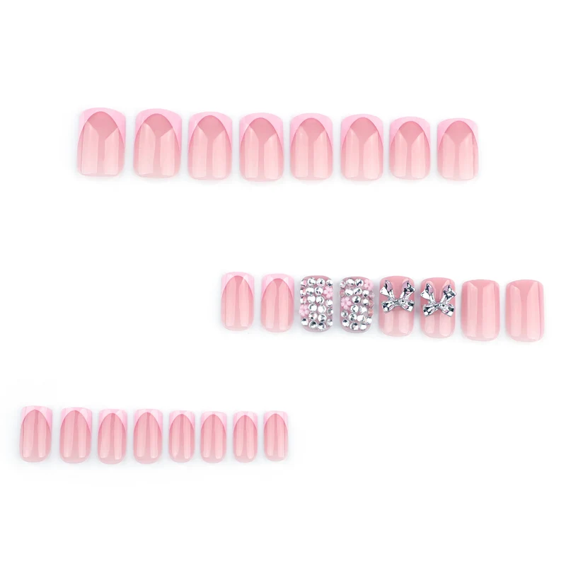Kunstvolle Nagelkunst mit Glitzerakzenten und Schleifenverzierung Karnz