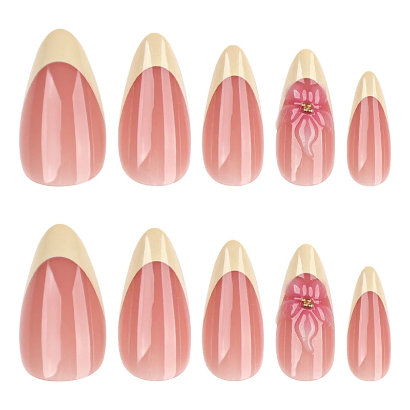 Kunstvolle Stiletto-Nägel mit elegantem Blüten-Akzent Karnz