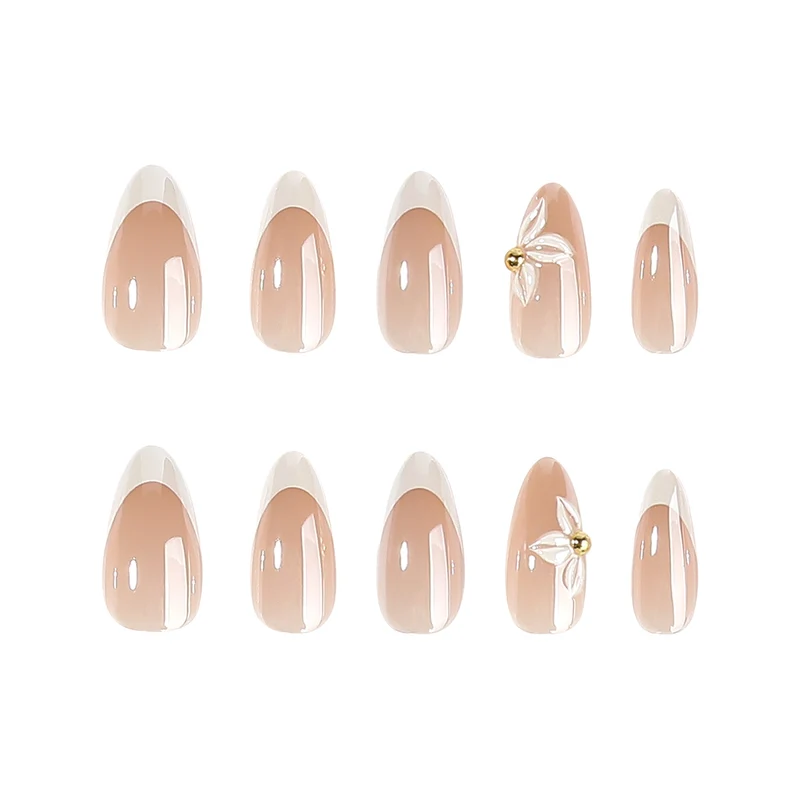 Kunstvolle Stiletto-Nägel mit elegantem Blumendesign Karnz