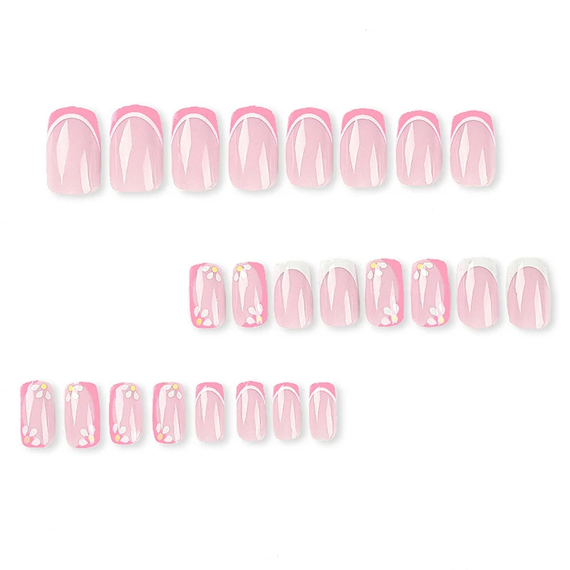 Kunstvolle Nagelkunst mit floralem Design und Glitzerakzenten Karnz