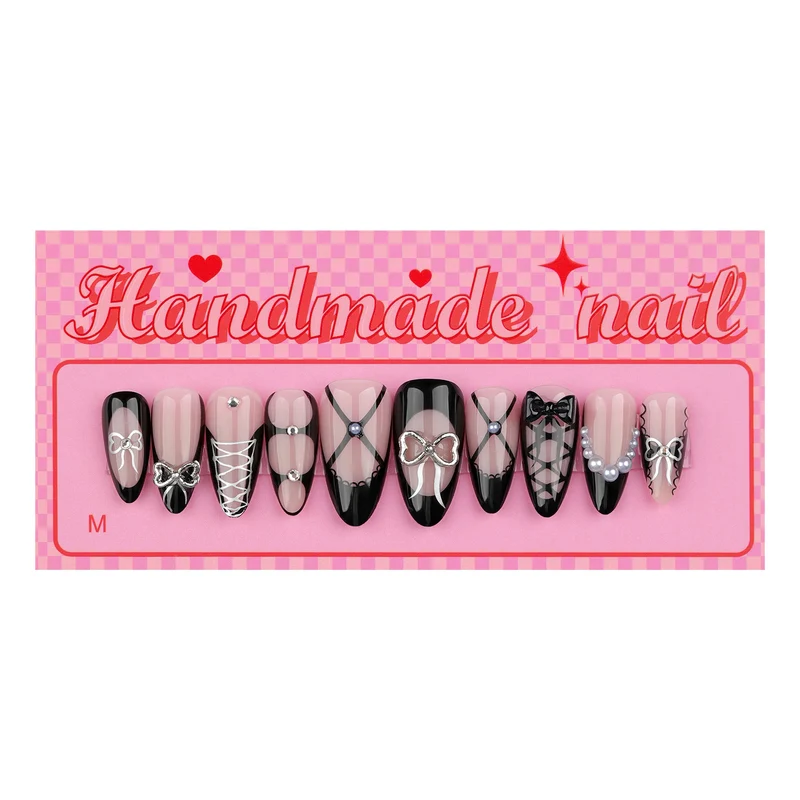 Kunstvolle Nagelkunst mit eleganten Schleifen und Glitzerakzenten Karnz