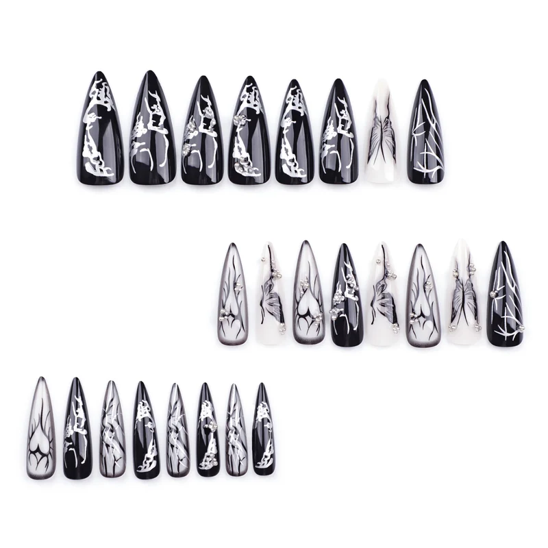Kunstvolle Nagelkunst mit elegantem Schwarz-Weiß-Design Karnz