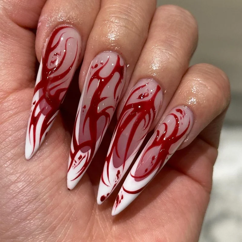 Kunstvolle Nagelverlängerungen mit kreativen Augen-Design Karnz