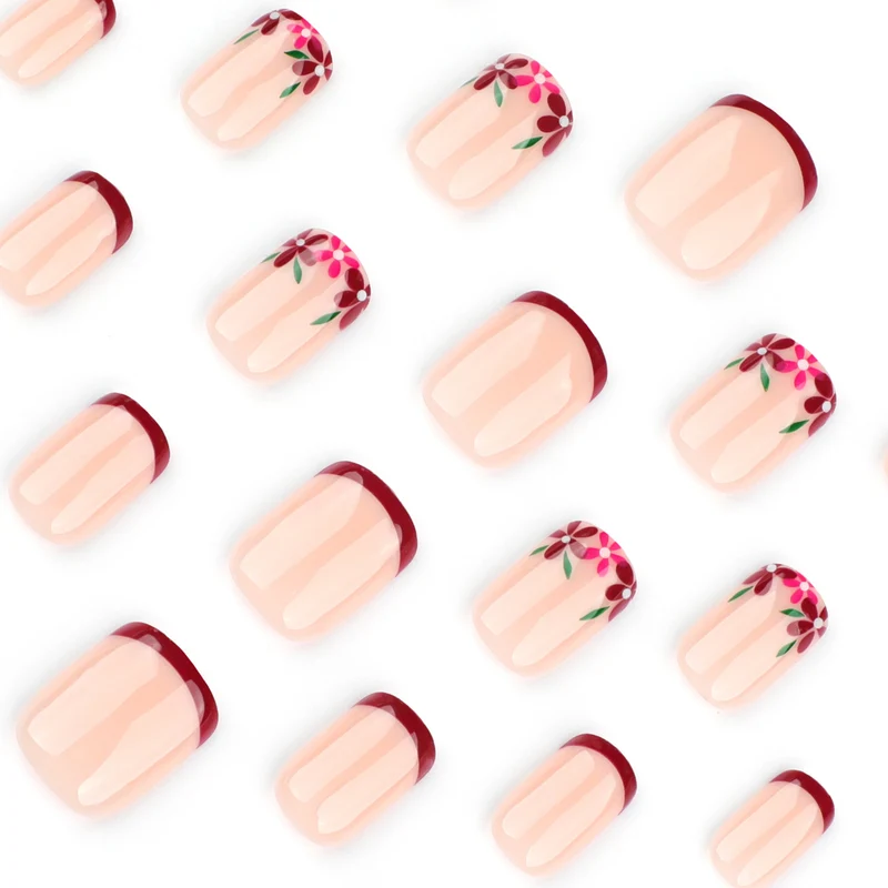 Kunstvolle Nagelgestaltung mit Blumen- und Farbverlaufseffekten Karnz