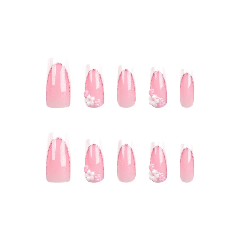 Kunstvolle Nagelverlängerungen mit Glitzer- und Blumenakzenten Karnz