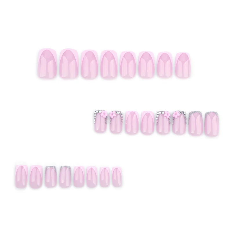 Kunstvolle Gel-Nägel mit eleganten floralem Design und Glitzerakzenten Karnz