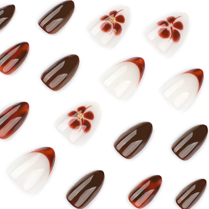 Kunstvolle Nagelverlängerungen mit eleganten floralem und glanzvollem Design Karnz