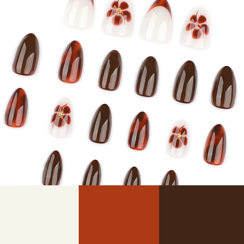 Kunstvolle Nagelverlängerungen mit eleganten floralem und glanzvollem Design Karnz