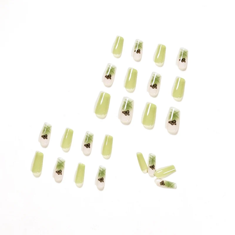Künstliche Nagelverlängerungen mit elegantem Schmetterlingsdesign Karnz