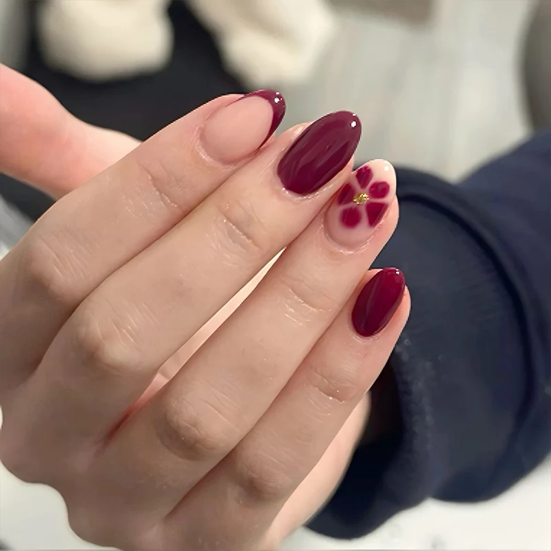 Künstliche Nagelkunst mit verspielten Punkten und Schleifen Karnz