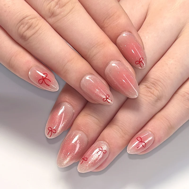 Künstliche Nagelkunst mit Schleifenmotiv Karnz