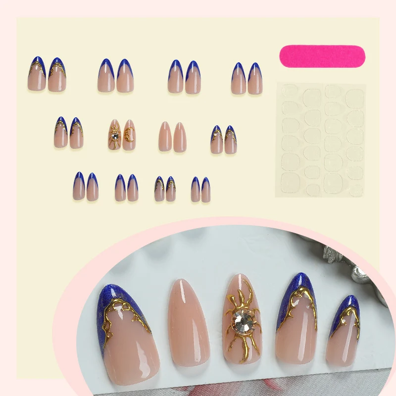 Kunstnagelset mit elegantem gold-blauen Design Karnz