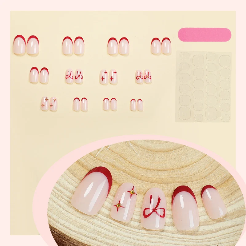 Kunstnagelset mit elegantem Bogen-Design und Glitzereffekten Karnz