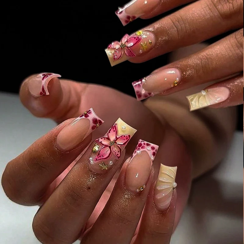 Kunstnagelset mit elegantem Blüten- und Glitzerdesign Karnz