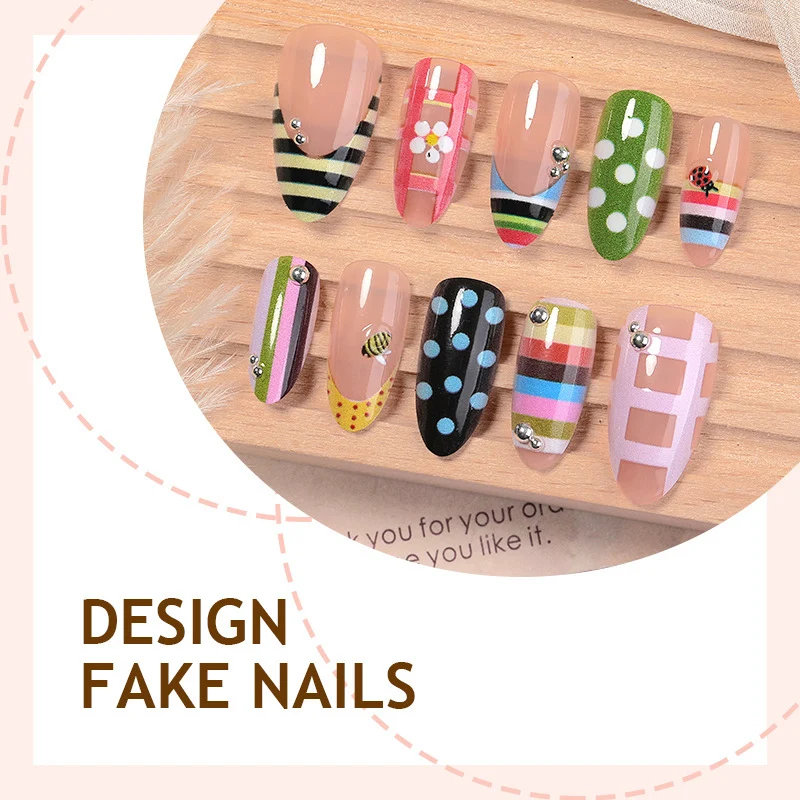 Kunstnagelset mit bunten Mustern und kreativen Designs Karnz