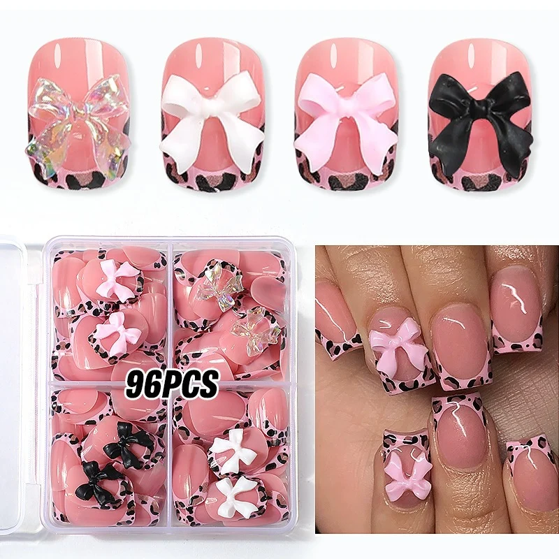 Kunstnagelset mit beeindruckenden Blumen- und Schleifenakzenten Karnz