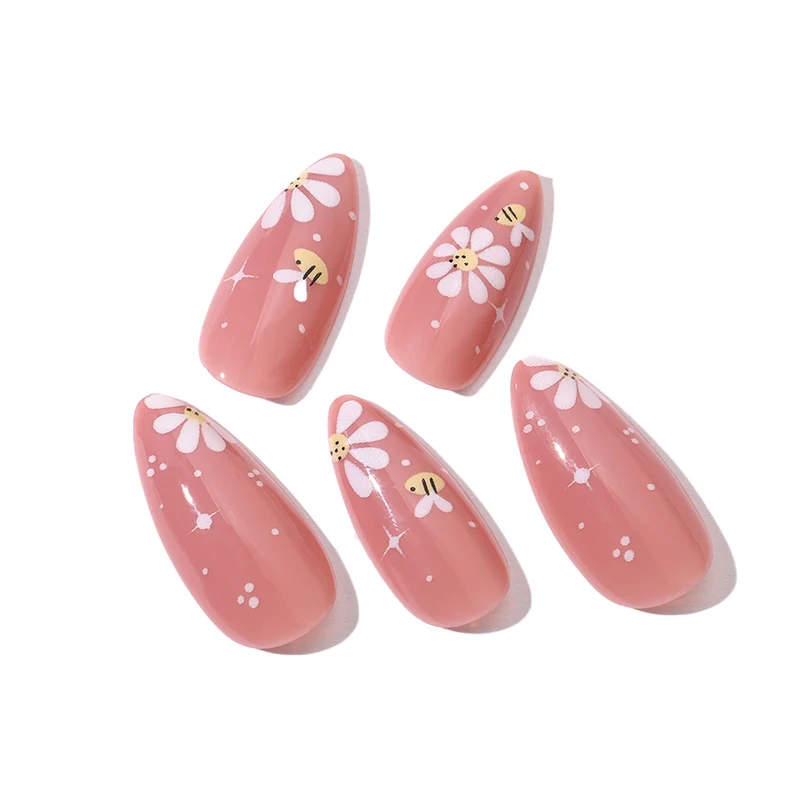 Kunstnägel Set mit eleganten Blüten und Glitzerakzenten Karnz