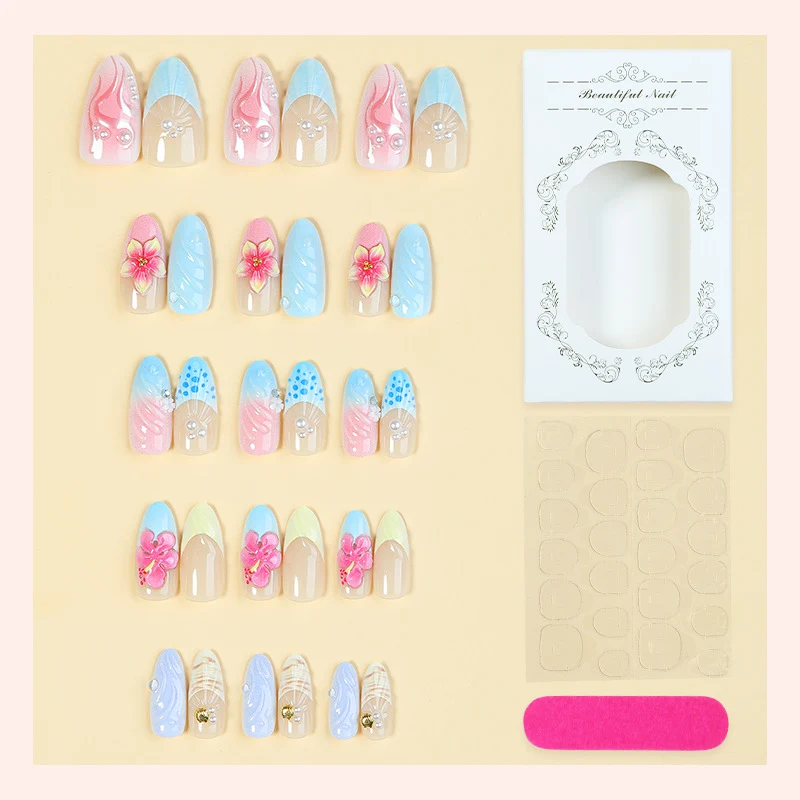 Künstliche Nagelset mit auffälligen Muschel- und Blütenmotiven Karnz