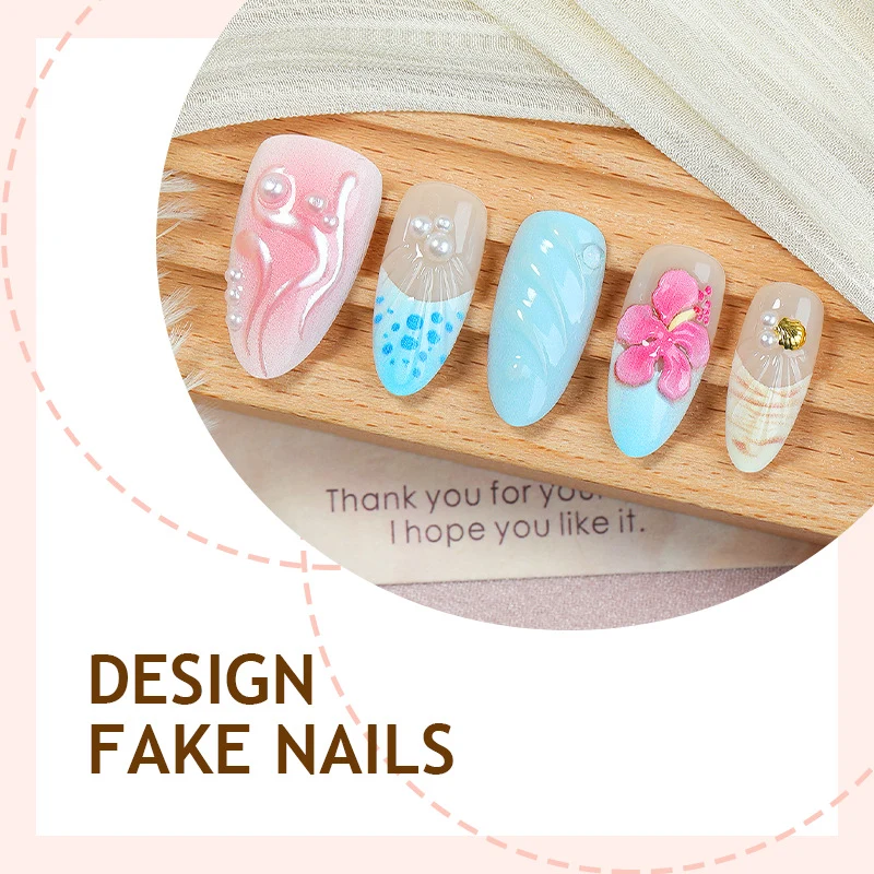 Künstliche Nagelset mit auffälligen Muschel- und Blütenmotiven Karnz