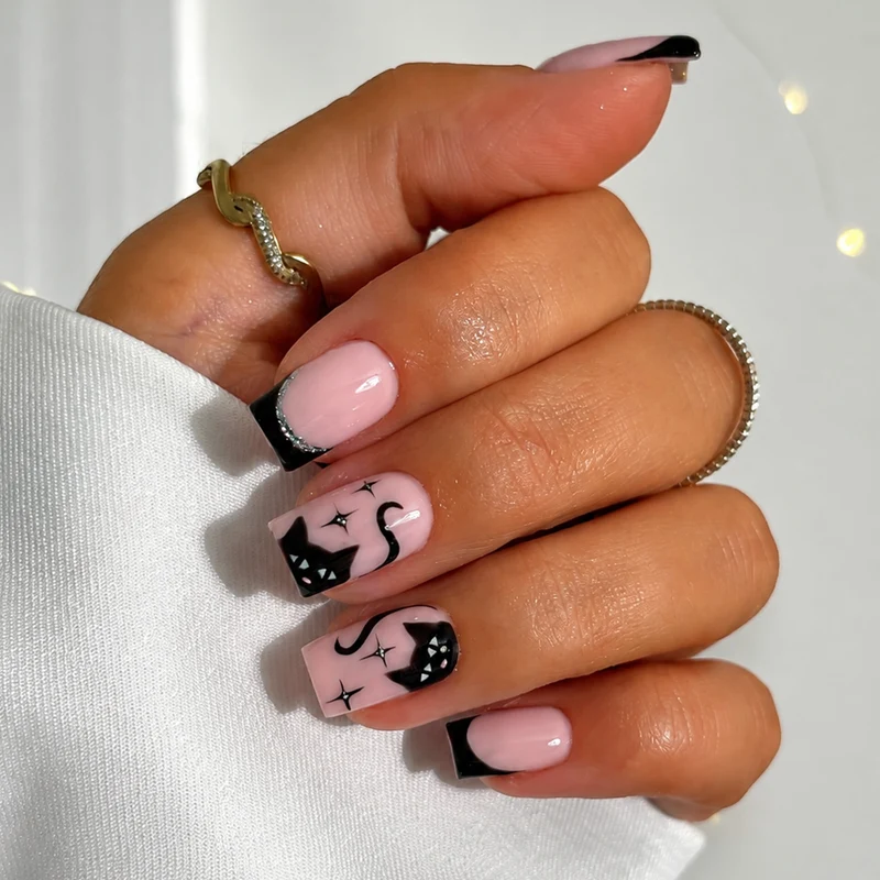 Kreatives Nagelset mit Katzen-Design und Glitzerdetails Karnz