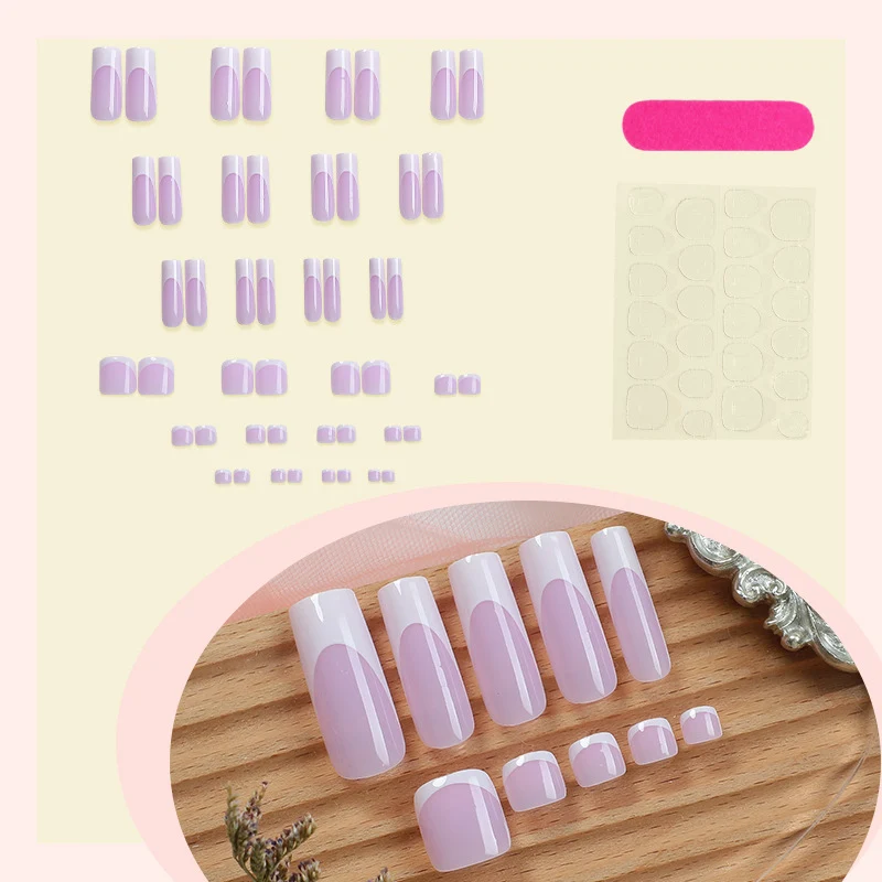 Kreatives Nagelset mit elegantem French-Tip und Glitzereffekten Karnz