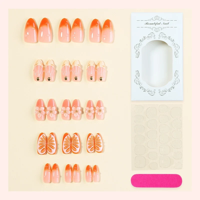 Kreatives Nagelset mit Blumen- und Fruchtverzierungen Karnz