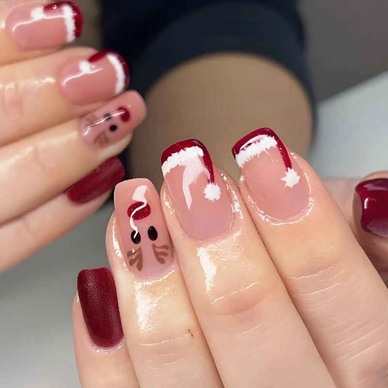 Kreatives Kunstnagelset mit winterlichen Motiv- und Glitzereffekten Karnz