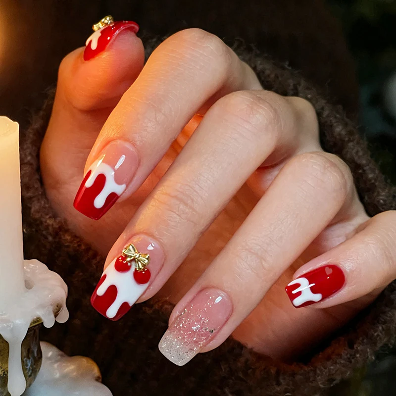 Kreatives Kunstnagelset mit verspieltem Zuckerguss-Design Karnz