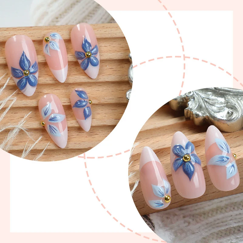 Kreatives Kunstnagelset mit aufwendigen Blumen-Designs Karnz