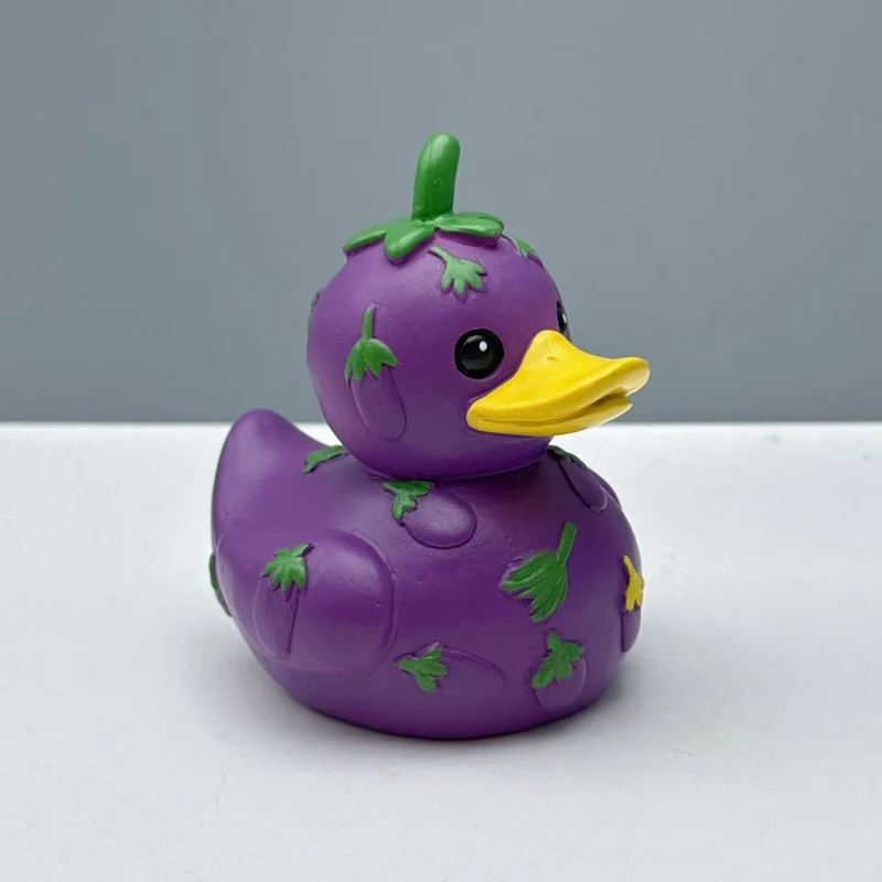Lustige Gummi-Ente mit Gemüse-Motiv Karnz