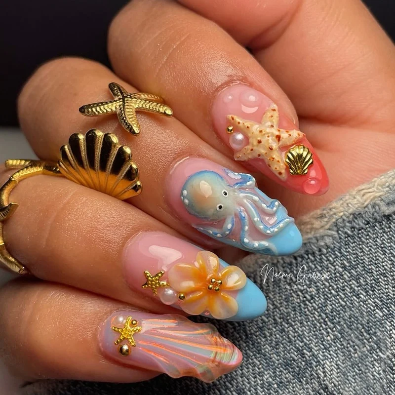 Festliches Kunstnagelset mit maritimen und floralen Designs Karnz