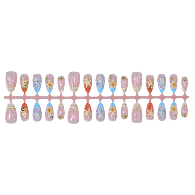 Festliches Kunstnagelset mit maritimen und floralen Designs Karnz