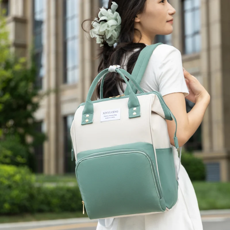 Stylische Multifunktions-Windelrucksack Karnz