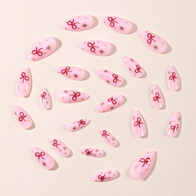 Stiletto-Nail-Art-Extensions mit Schleifenakzenten Karnz