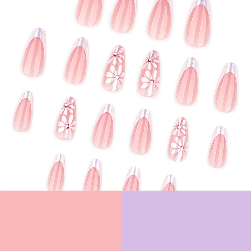 Elegante Kunstnägel mit floralem Design und Glitzerverzierungen Karnz