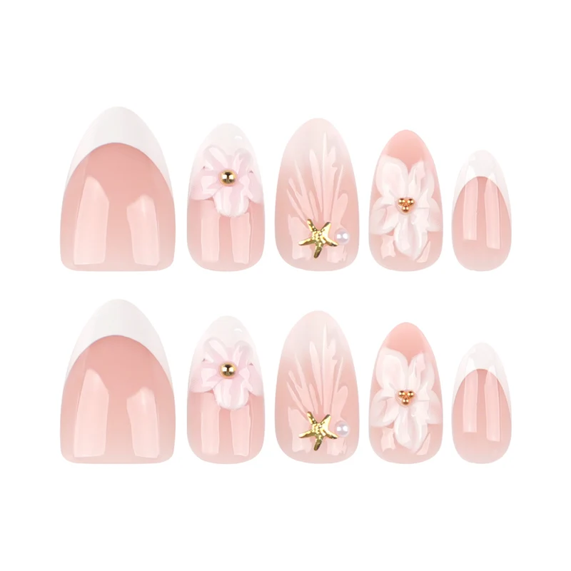 Elegante Kunstnägel mit floralem Design und Glitzerakzenten Karnz