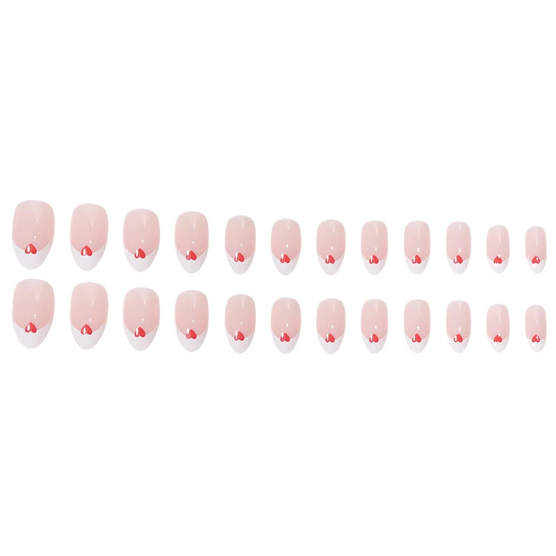Herzgeschmücktes French Tip Nagelset Karnz