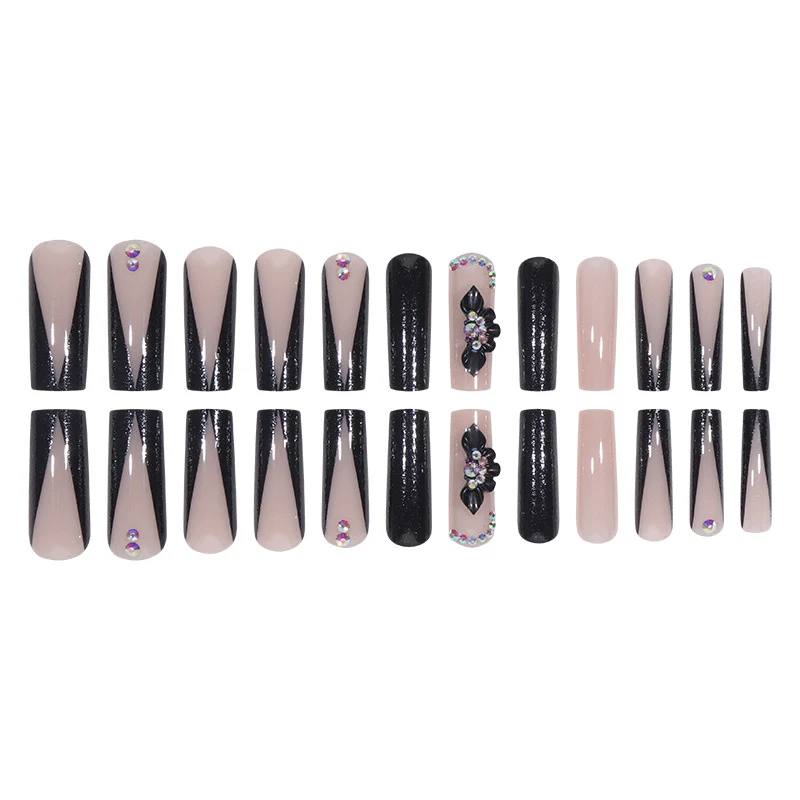 Glamouröse Lange Stiletto Press-On Nägel mit Glitzer und Blütenakzenten Karnz